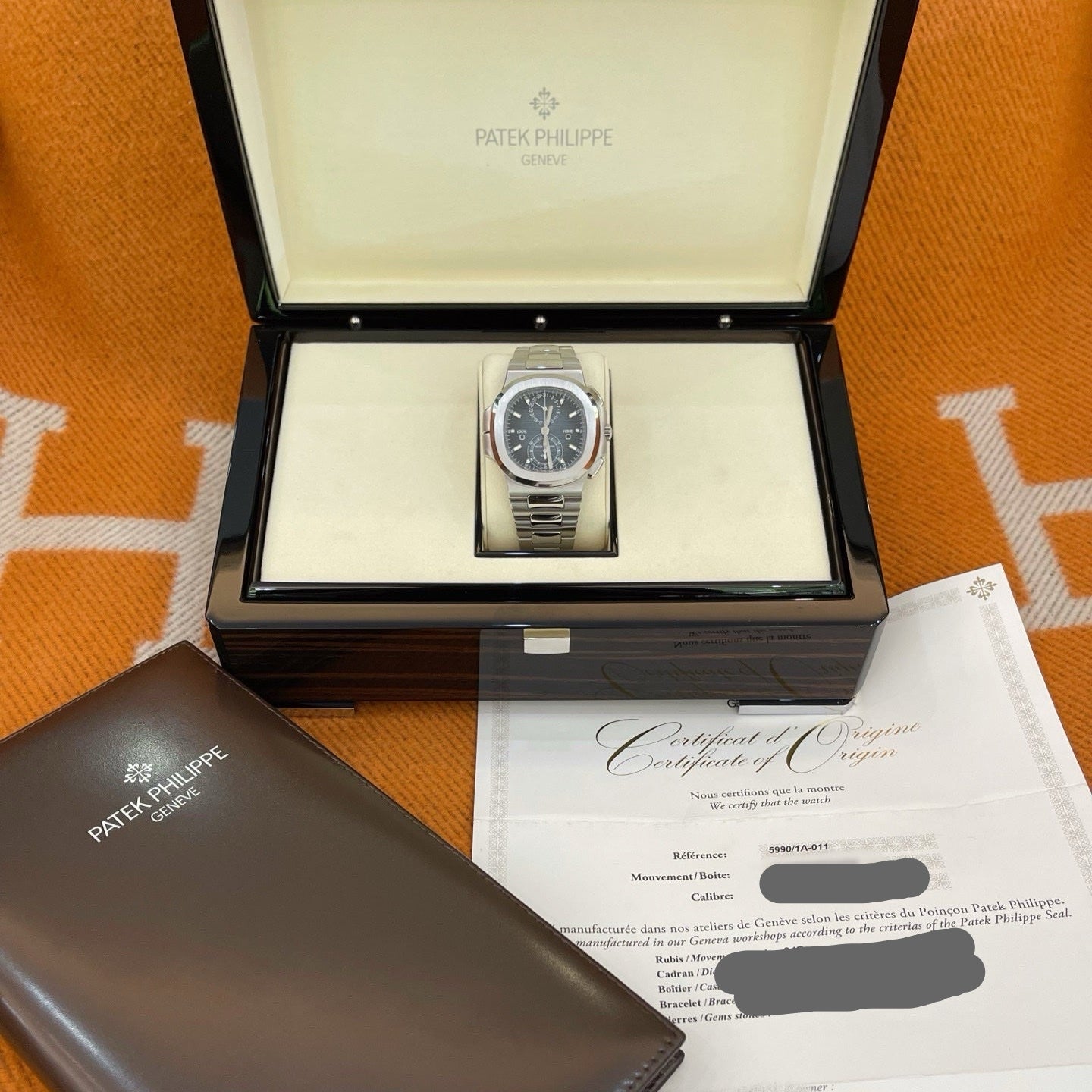 2025 Unworn Patek Philippe - 5990/1A-011 Nautilus Travel Time Stainless Steel / Blue