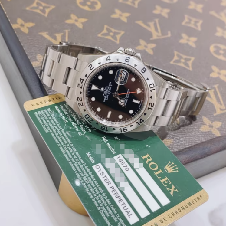 2011 Pre-owned Rolex - 16570 Explorer II Black Superluminova