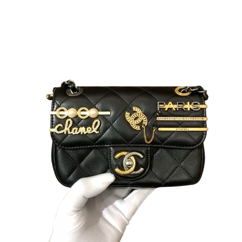 CHANEL Lambskin Quilted Coco Clips Mini Flap Bag In Black