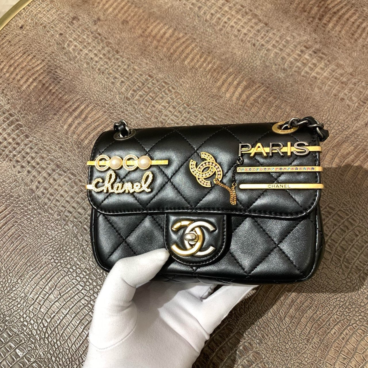 CHANEL Lambskin Quilted Coco Clips Mini Flap Bag In Black